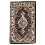Hand Knotted Area Rug in Black And Cream