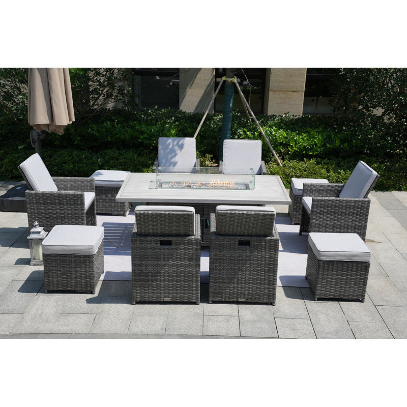 Bentlei 10 - Person Wicker Patio Dining Set with Rectangular Table , Cushions Included