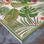 Tapis d'intérieur / extérieur ivoire / vert forêt à motif floral Mayshar-23586078