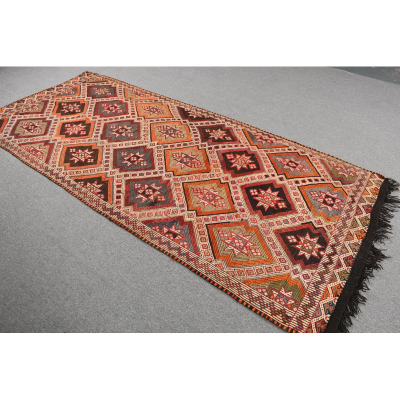 Tapis turc vintage tissé à la main avec un motif géométrique richement coloré pour une esthétique intérieure élégante