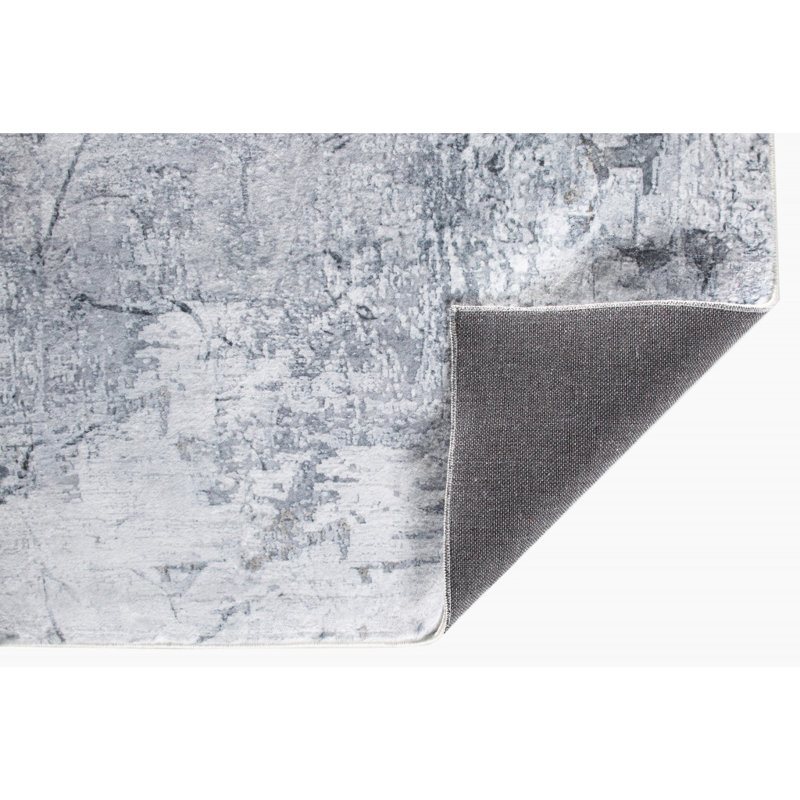 Tapis gris en marbre patiné