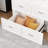 Space-Saving White Murphy Bed With Storage And Built-In Power Strip