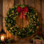 Couronne de Noël épinette 48 po pré-éclairée avec arc décoratif, 8 modes d'éclairage, baies rouges et pommes de pin