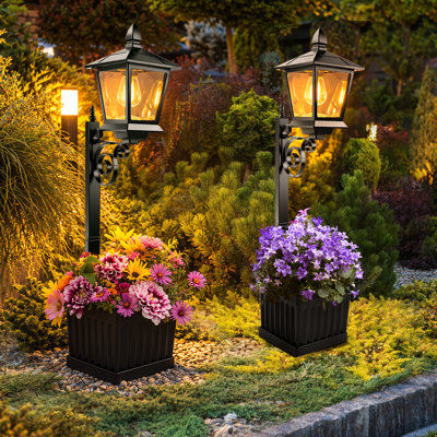 Lot de 2 lampes solaires d'extérieur pour jardinières, lanterne solaire vintage à lumière chaude avec pot de fleurs, étanche IP65, fixation murale et au sol, idéale pour terrasse, jardin et cour.