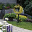 Porte-dévidoir de jardin avec boyaux d'ancrage