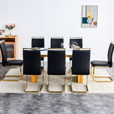 Élégante configuration de salle à manger pour 8 personnes: table à pieds et chaises en similicuir doux Rangement élégant pour 8 personnes: sièges en verre confortables