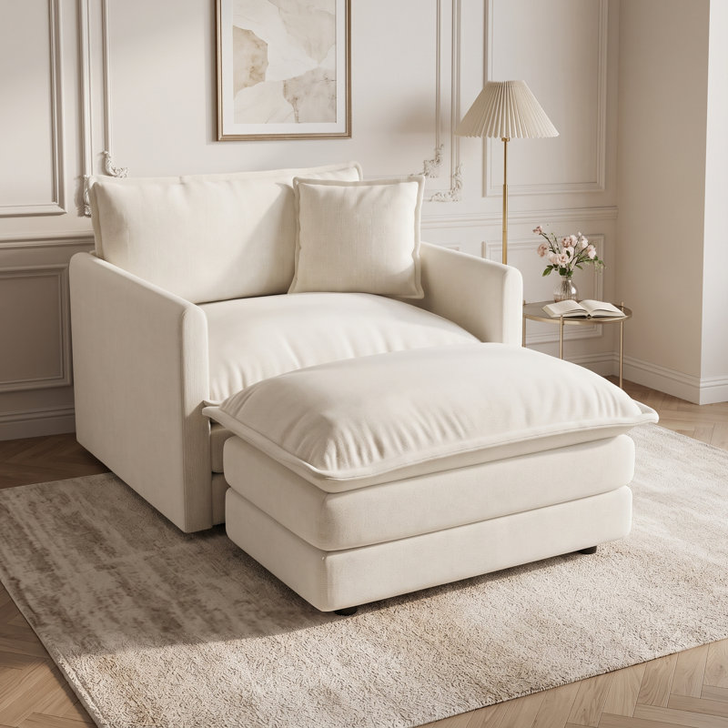 Chaise longue rembourrée avec repose-pieds assorti et coussins moelleux, blanc crème