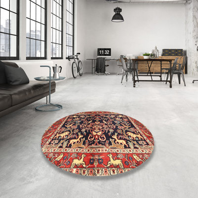 Tapis rouge / noir à motif floral
