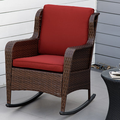 Chaise berçante d'extérieur en métal avec coussins