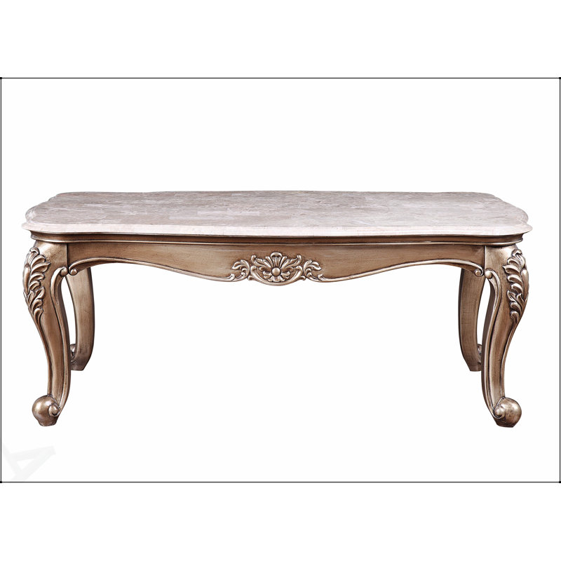 Table basse Jayceon avec plateau en marbre et finition champagne, durable et élégante pour tout espace de vie