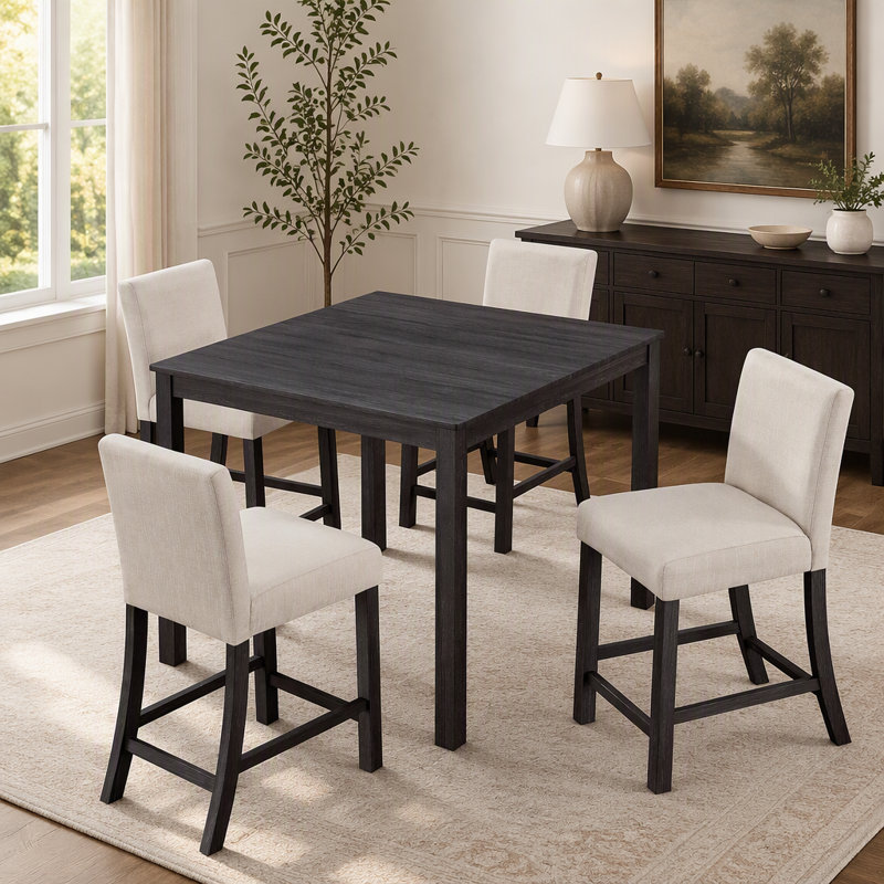Ensemble table et chaises de salle à manger modernes cinq pièces, hauteur comptoir, pour les cuisines compactes.