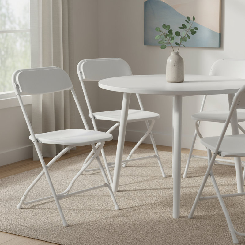 Ensemble de quatre chaises de salle à manger pliantes empilables en métal blanc
