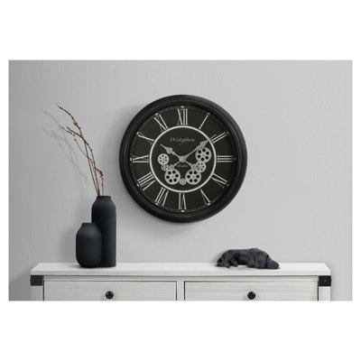 Horloge murale ronde 23 po avec mécanisme de déplacement, verre trempé noir et design en métal