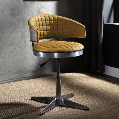 Tabouret mobile en cuir de curcuma avec base en métal et rembourrage de siège