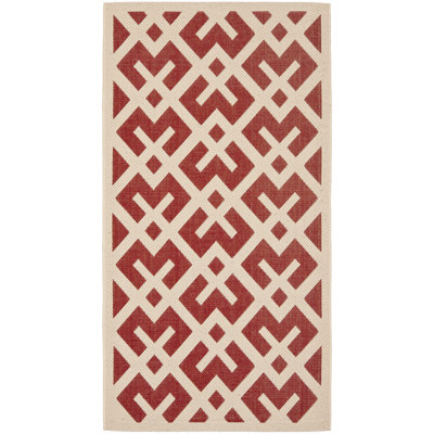 Tapis intérieur / extérieur à motif géométrique tissé à plat rouge Arneshia