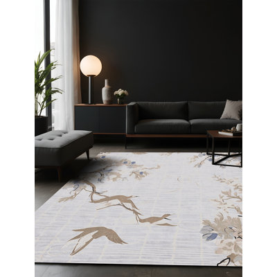 Tapis blanc soyeux et moelleux