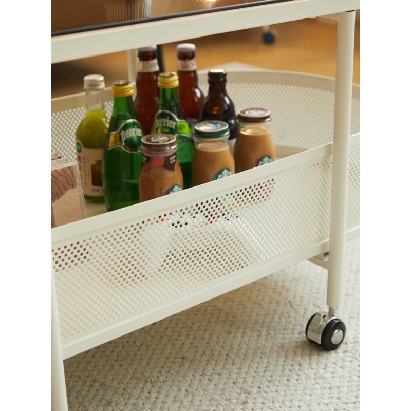 Table basse mobile ovale en verre et métal avec rangement