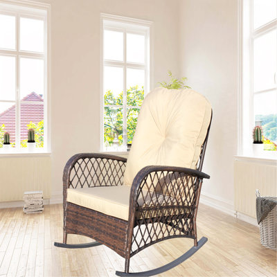 Chaise berçante d'extérieur en osier avec assise large, coussin épais et moelleux, chaise berçante en rotin avec structure en acier, capacité de poids élevée pour le patio, le jardin, la cour arrière, coussin brun peu profond
