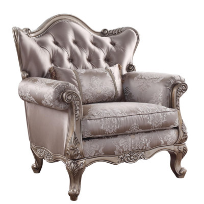 Fauteuil à oreilles capitonné Kalene