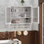 Armoire murale avec trois niveaux de rangement et porte-serviettes