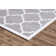 Tapis argenté à motif géométrique tendance
