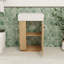 Meuble-lavabo de 21,6 po avec lavabo en céramique et rangement à gauche