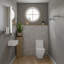 Lavabo de salle de bain mural blanc avec trop-plein