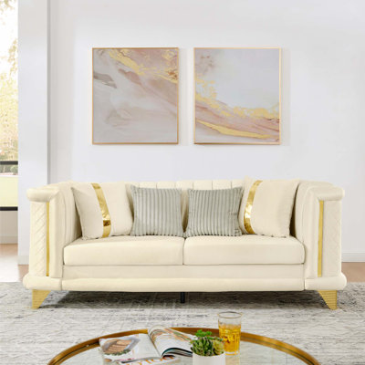 Canapé 3 places en velours de luxe avec garnitures en acier inoxydable et motif capitonné brodé