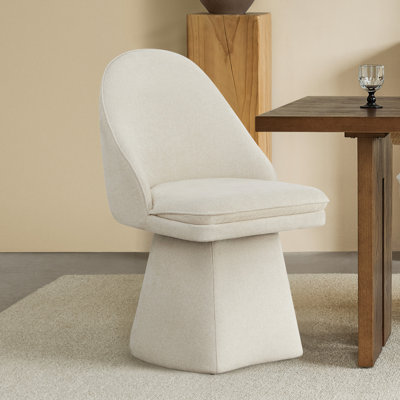 Chaise rembourrée pivotante en tissu Lomena