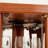 Lighted Corner Glass Cabinet, Dark Oak , Two - Section Design, Adjustable Shelving, Toppling, For Collectible Display In Living Room Unit, Suitable Cherry Or Inspired Spaces