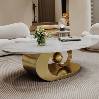 Table basse en marbre avec base sculpturale en acier inoxydable