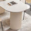 Une table de salle à manger en pierre robuste et durable-341551681-341551682