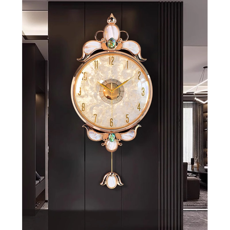 Horloges murales en forme de coquillage en métal doré blanc, H 15,16 po x l 34,25 po