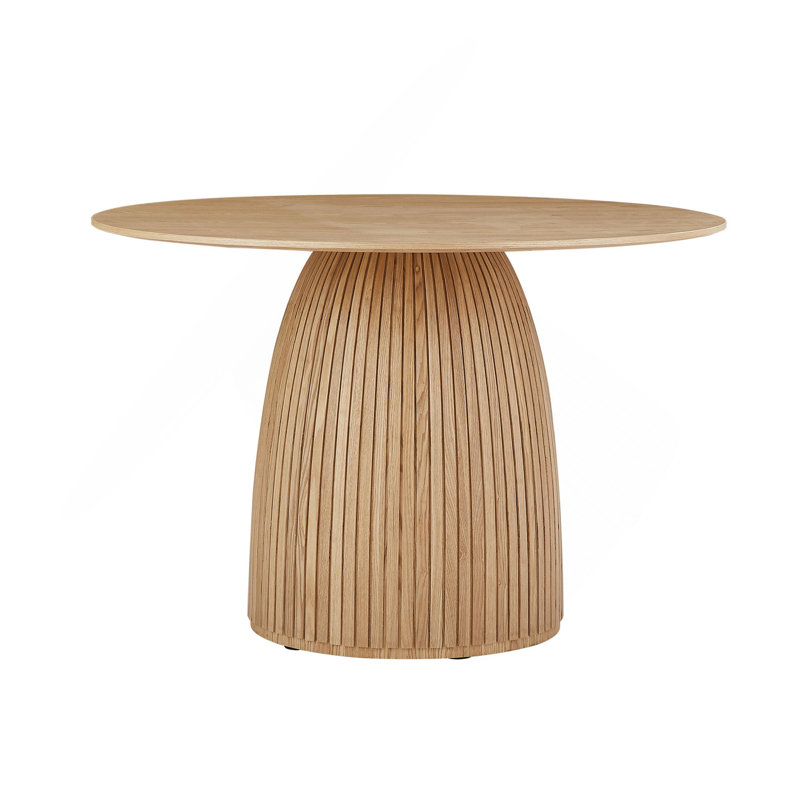 Charmante table de salle à manger circulaire moderne avec une construction robuste pour un repas élégant