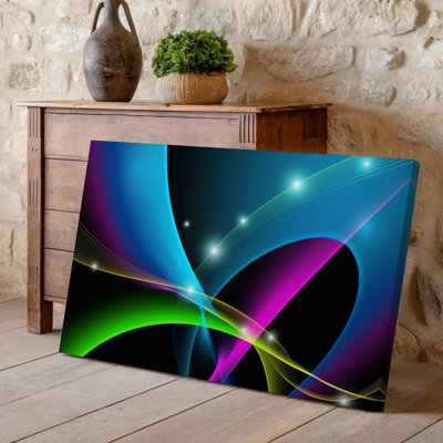 La toile crée une conception abstraite visuellement frappante avec un art mural dégradé fluide qui mélange des couleurs vibrantes telles que l'art mural sur toile