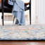 Oriental Power Loom Ivory/Blue Area Rug-66093990