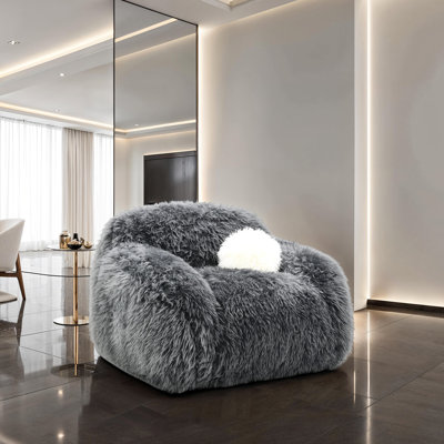 Fauteuil pivotant contemporain en fausse fourrure gris foncé, doux et luxueux, pivotant à 360°, à poils longs et duveteux, avec coussin, 110 cm (l) x 99,5 cm (p) x 80 cm (h), confort optimal pour le salon.