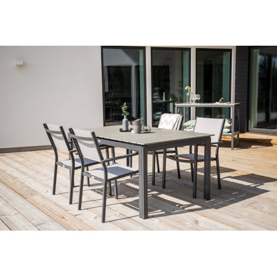 Faiyaz 4 - Person Wood Patio Dining Set with Extendable Rectangular Table