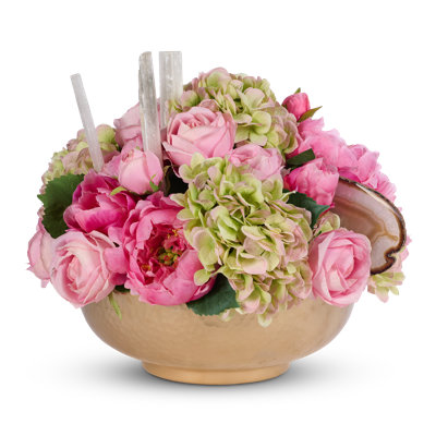 Pink peonies and hydranges in gold hammered metal container