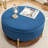 Charyn Upholstered Round Storage Ottoman-1465735373