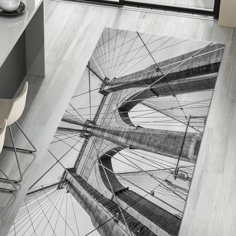 Tapis à motif géométrique moderne non tissé à motif mince avec un subtil agencement de gris et de blanc avec un motif en treillis complexe