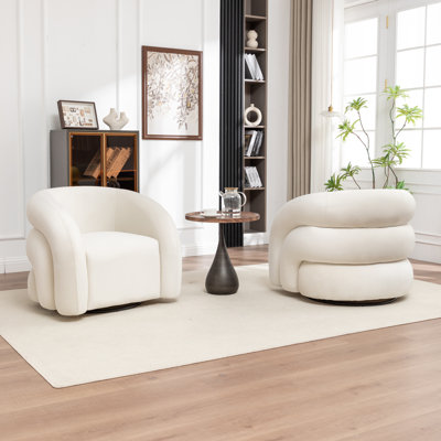 Fauteuil demi-tonneau pivotant rembourré Coyle