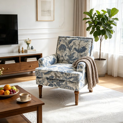 Fauteuil d'appoint rembourré avec garniture cloutée