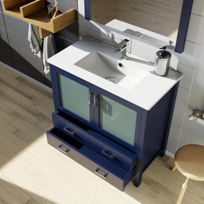 Ensemble de meuble-lavabo avec comptoir en céramique blanche et robinet
