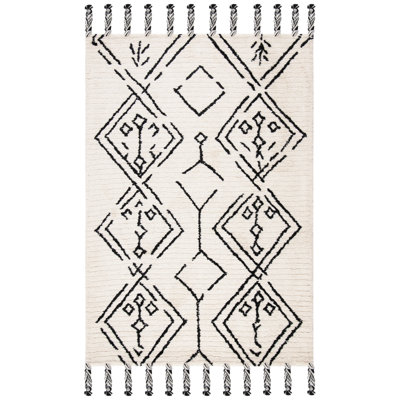Tapis ivoire / noir en laine touffeté à la main Ezzie Southwestern