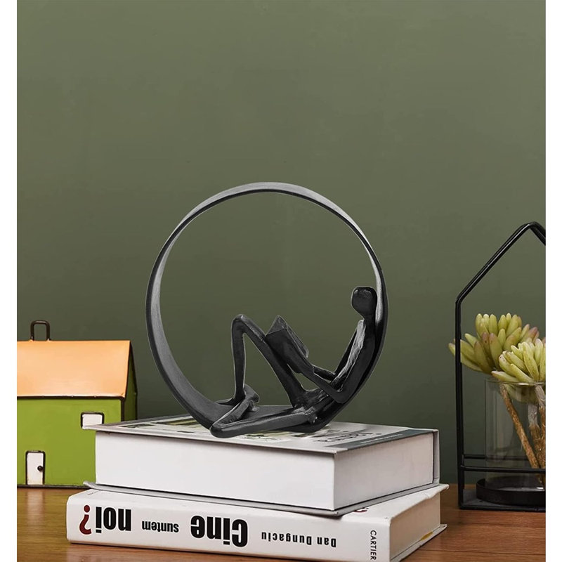 Figurines de lecture et statues