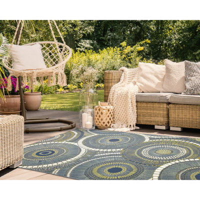 Bungalow Rose Lohyn Circles Indoor/Outdoor Rug Azure