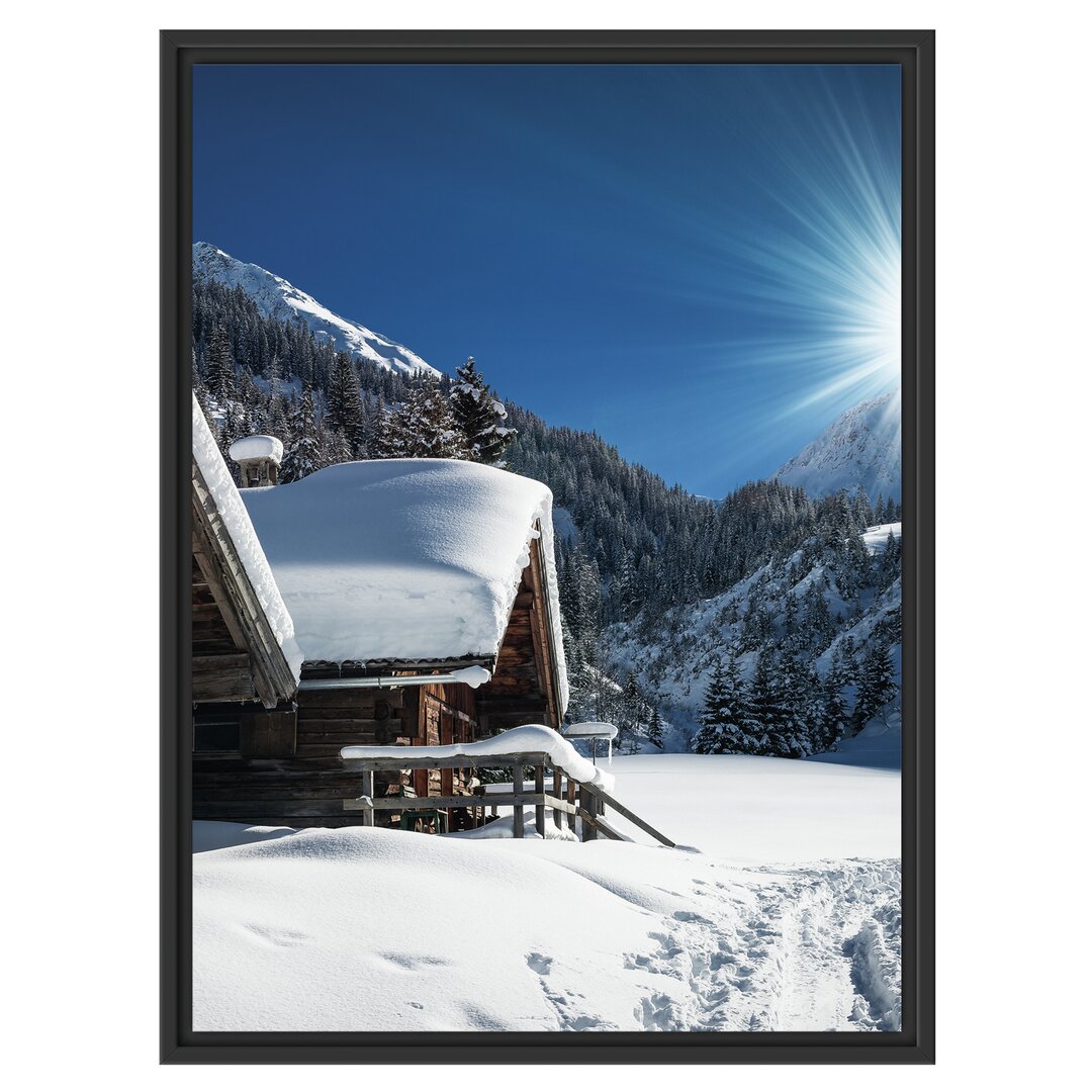 Gerahmtes Wandbild Verschneite Alpenhütte