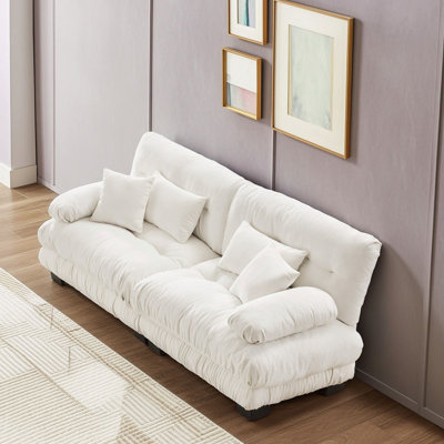 Canapé moderne avec accoudoirs à traversin rond, coussins de siège profonds et coussins décoratifs