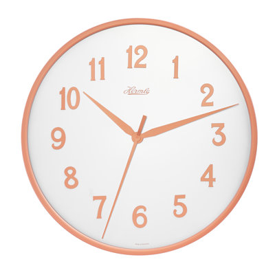 Sleek, modern wall clock in rose gold. Quartz time only movement.
